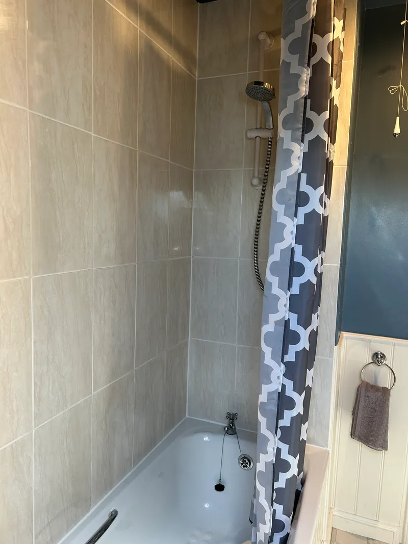 Bathroom with shower and bath